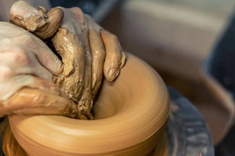closeup-male-potters-hands-making-vase-pottery-making-ceramics